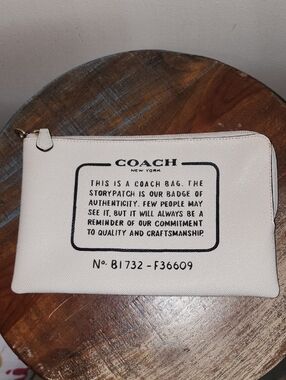 Coach New York Cream Wristlet Zipper Pouch Black Story Patch Logo Print